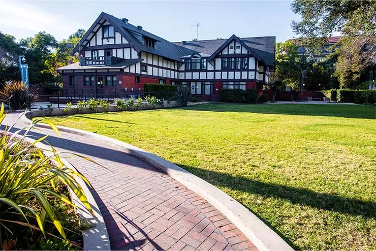 Exterior of Amat House and its lawn at Doheny Campus