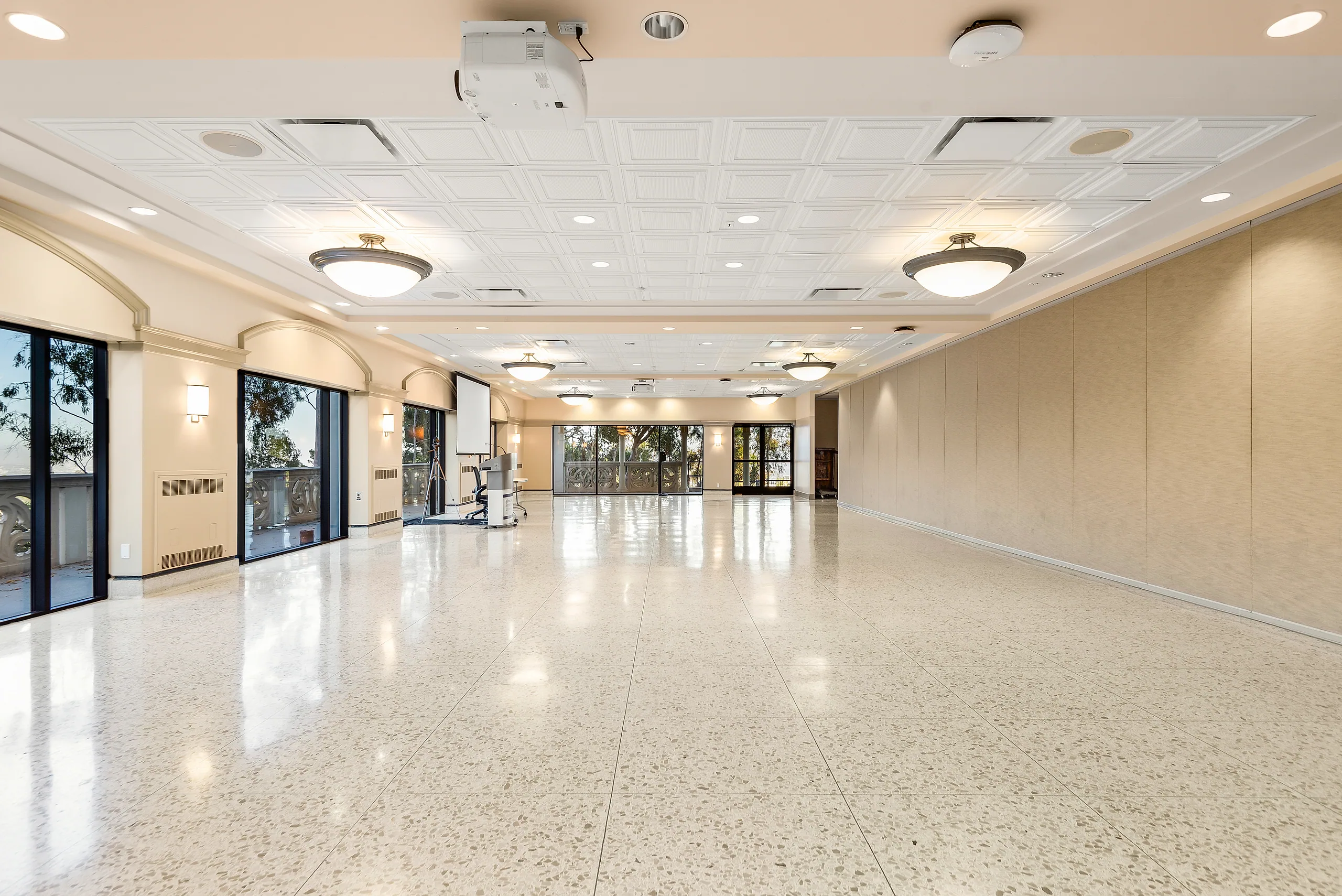 Open banquet-ready event hall inside the Chalon Campus Center