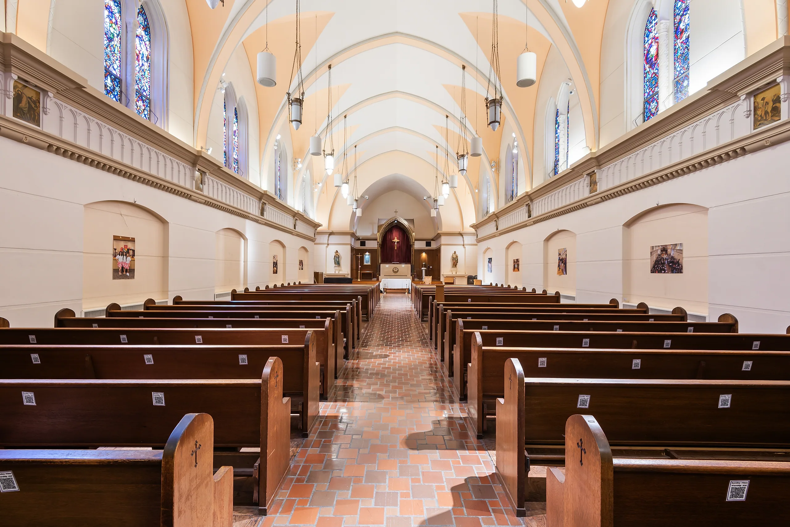 The warm interior of Mary Chapel at Mount Saint Mary’s University Chalon Campus
