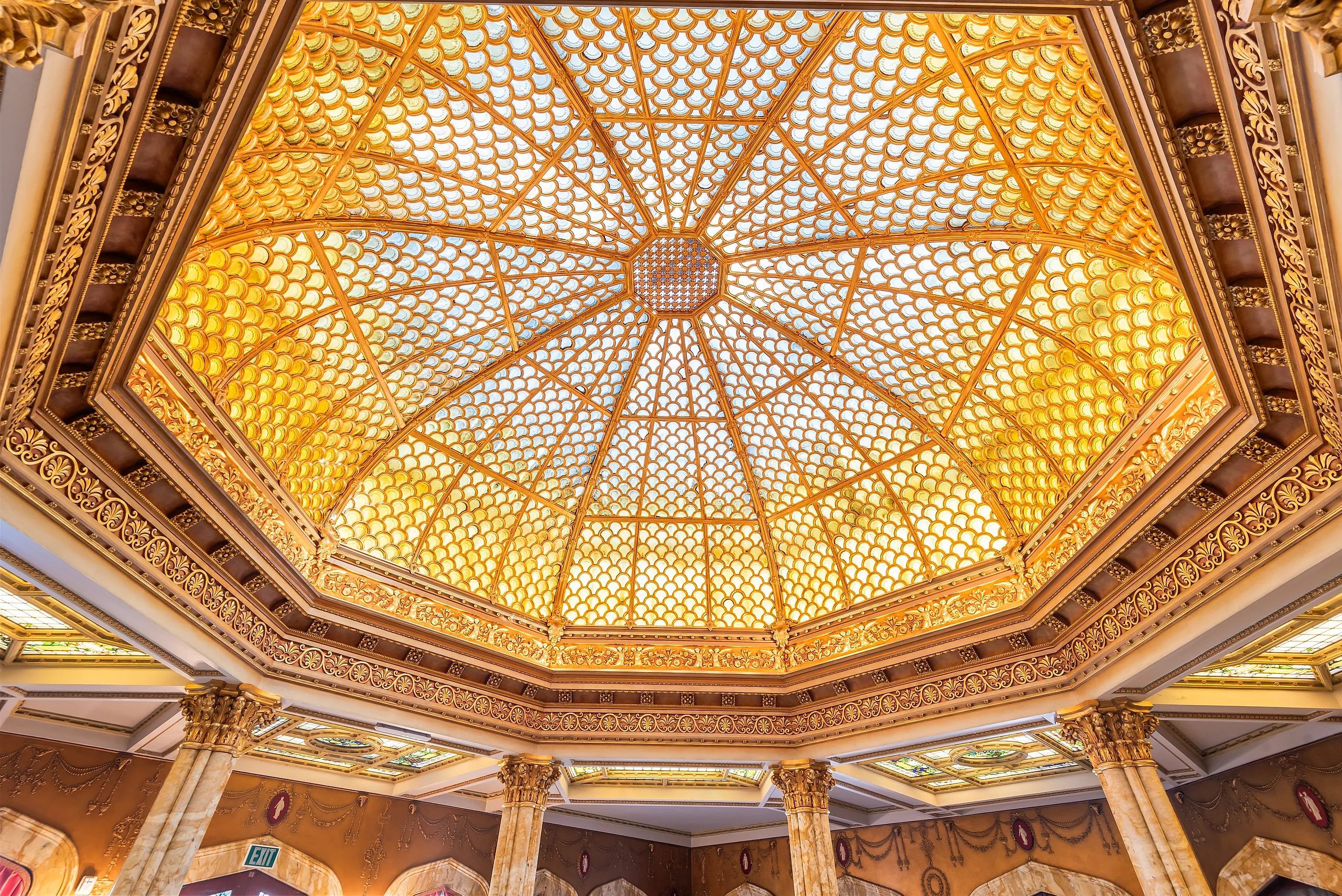 The iridescent Tiffany glass dome of the Pompeian Room inside Doheny Mansion