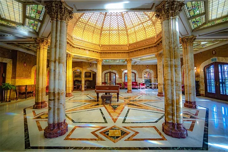 Pompeian Room interior beneath its iridescent Tiffany glass dome