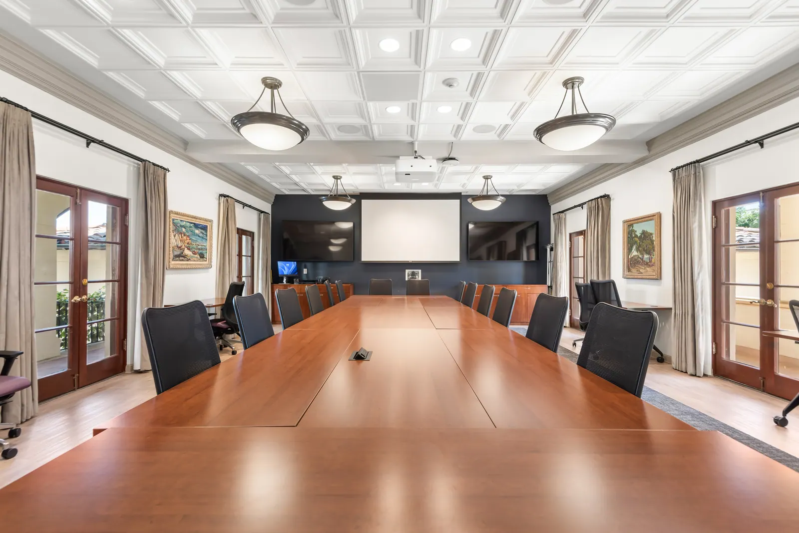 Boardroom seating around a long conference table inside Hannon Parlor at Chalon Campus